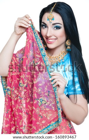 https://thumb1.shutterstock.com/display_pic_with_logo/743137/160893467/stock-photo-beautiful-young-indian-woman-in-traditional-clothing-160893467.jpg