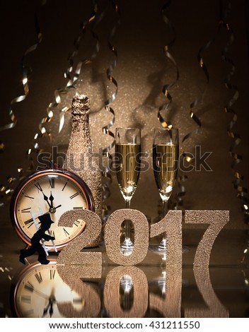 New Years Eve celebration background with pair of flutes, bottle of champagne, clock and a chimney sweep as lucky charm