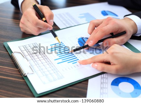 https://thumb1.shutterstock.com/display_pic_with_logo/753733/139060880/stock-photo-image-of-male-hand-pointing-at-business-document-during-discussion-at-meeting-139060880.jpg