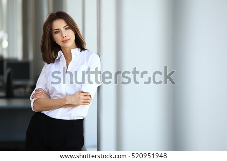 Modern business woman in the office with copy space