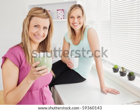 stock-photo-portrait-of-two-happy-women-