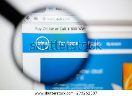 LISBON, PORTUGAL - June 6, 2015. Photo of Dell homepage on a monitor screen through a magnifying glass.