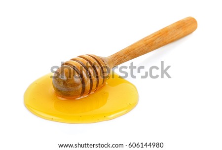 Wooden honey dipper with honey