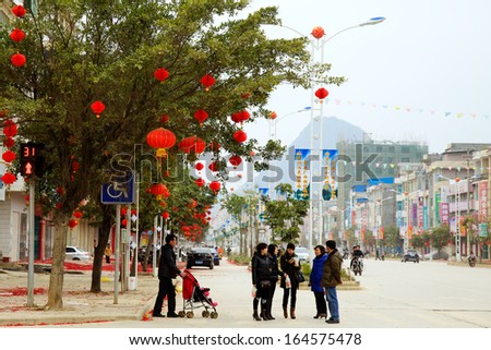 Chinese new year of Jingxi, a Chinese county with Vietnamese style, located at the border of China and Vietnam. 99% of the local people are Zhuang ethnic (Tay, nung ethnic in Vietnam) people.