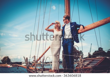 stock photo stylish wealthy couple on a luxury yacht 363606818