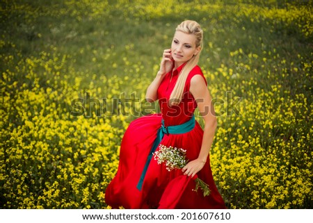 https://thumb1.shutterstock.com/display_pic_with_logo/785125/201607610/stock-photo-beautiful-young-blonde-woman-in-red-dress-with-camomile-flowers-in-green-field-201607610.jpg