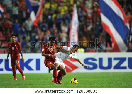 BANGKOK THAILAND-NOVEMBER 30:Nguyen Trong Hoang of Vietnam ( white) in action during the AFF Suzuki Cup between Vietnam and Thailand at Rajamangala stadium on Nov30, 2012 in Bangkok,Thailand.