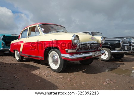  car Volga GAZ21, under a cloudy sky. Exhibition of vintage cars in