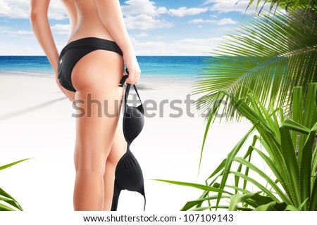 Close up view of nice smooth woman�s legs on color back