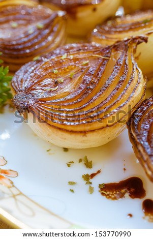 Rich browned golden caramelized balsamic onions roasted in the oven.