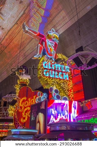 LAS VEGAS - MAY 17 : Cowgirl neon sign in downtown Las Vegas on May 17 ...