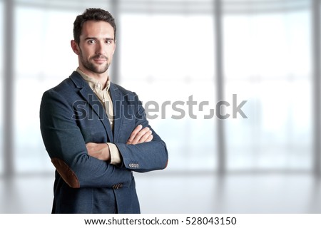 Casual business man with arms crossed