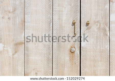 detail of a wooden door made of scaffolding - stock photo