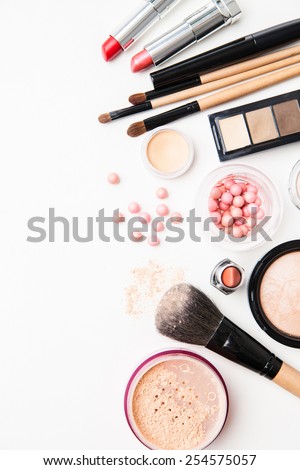 Brush and cosmetic isolated on a white background. Top view.