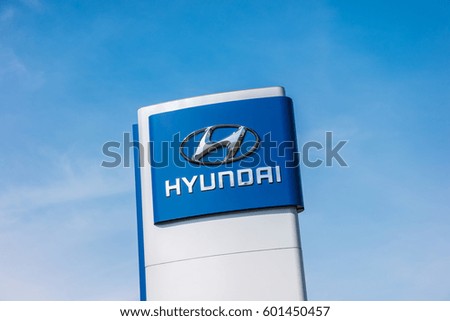 AACHEN, GERMANY MARCH, 2017: Logotype of Hyundai corporation over blue Sky. Hyundai is the South Korea's automotive manufacturer.