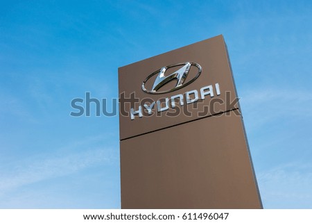 BAESWEILER, GERMANY MARCH, 2017: Logotype of Hyundai corporation on pillar against blue Sky. Hyundai is the South Korea's automotive manufacturer.