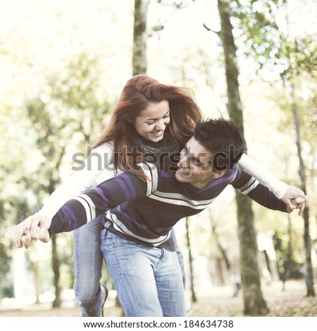 https://thumb1.shutterstock.com/display_pic_with_logo/81251/184634738/stock-photo-young-couple-having-a-good-time-together-at-the-park-selective-focus-with-shallow-dof-184634738.jpg