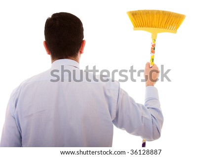 businessman holding a cleaning broom (isolated on white)