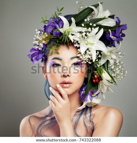 https://thumb1.shutterstock.com/display_pic_with_logo/813691/743322088/stock-photo-beautiful-asian-woman-with-flower-on-her-head-young-beauty-fashion-makeup-743322088.jpg