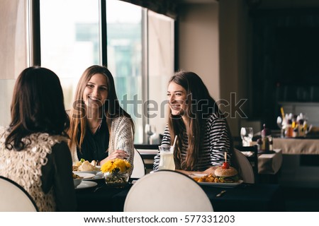 Girl eats out friend