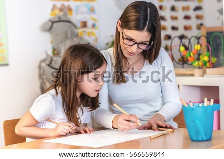 Teacher Mom working with Creative Kid