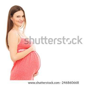 Portrait of the young happy smiling pregnant woman