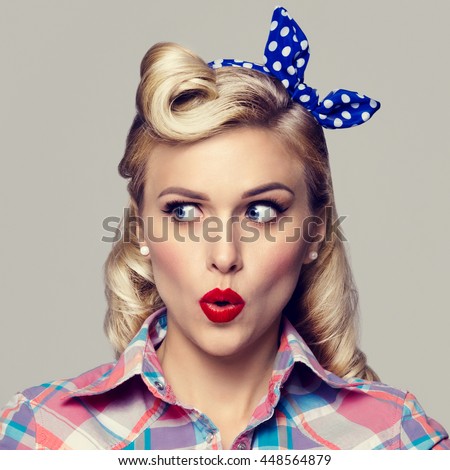 https://thumb1.shutterstock.com/display_pic_with_logo/82755/448564879/stock-photo-portrait-of-beautiful-young-surprised-woman-dressed-in-pin-up-style-caucasian-blond-model-posing-448564879.jpg