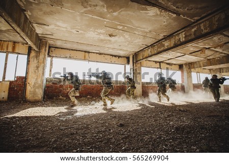 Army soldiers during the military operation. war, army, technology and people concept