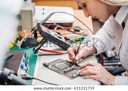 Woman Repairing Computer Part Service Center Stock Photo Royalty Free Shutterstock