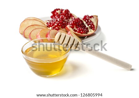 Cut into slices of apples, pomegranate and bowl of honey over white. Illustration of Rosh Hashanah (jewish new year) or Savior of the Apple Feast Day