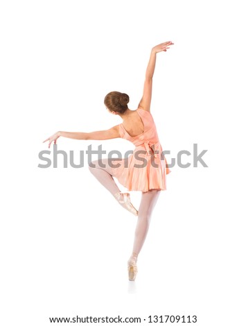 Young beautiful ballet dancer isolated over white background