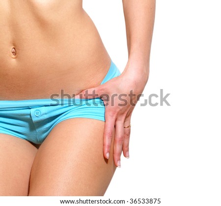 Belly of beautiful young female sportsman isolated on white