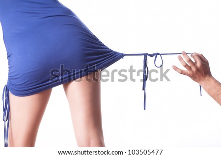Nice girl from back with a mini skirt and a man hand