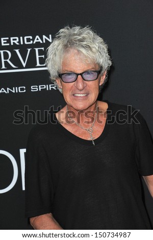 Reo Jobs Kevin Cronin, of REO Speedwagon, & wife at the Los Angeles premiere of "