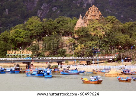Old cham towers, bridge and boats in Nha Trang, Vietnam