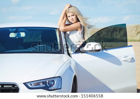 http://thumb1.shutterstock.com/display_pic_with_logo/853513/151406558/stock-photo-beautiful-young-sexy-woman-near-car-outdoor-rich-hot-blond-slim-girl-with-long-healthy-hair-posing-151406558.jpg