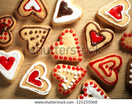 Heart shaped cookies on wooden table background