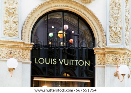 Milan, Italy - October 24, 2016: Louis Vuitton Sign of street shop window in Milan.