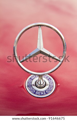 HUA HIN, THAILAND - DEC 16: Mercedes-Benz logo Vintage cars display in Hua Hin Vintage Cars Parade Festival 2011 at Hua Hin floating market on December 16, 2011 in Hua Hin, Thailand.