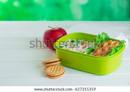 Healthy Food Concept Open Lunch Box Filled With Rice And Sandwich On White Wooden Background Healthy Food Concept Open Lunch Box Filled With Rice And Sandwich On White Wooden Background