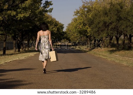 http://thumb1.shutterstock.com/display_pic_with_logo/8647/8647,1179084492,10/stock-photo-brunette-walking-away-from-camera-down-tree-lane-with-suitcase-and-day-dress-3289486.jpg