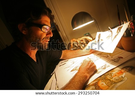 ISTANBUL, TURKEY - SEPTEMBER 9: Famous Turkish cartoonist, comic novelist, graphic artist and magazine publishers Ergun Gunduz portrait on September 9, 2009 in Istanbul, Turkey. 