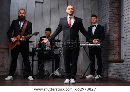 Men in suits band Men in Suits, a septet of business execs, will join forces with the horn section of the Toronto Star’s in-house band, Holy Joe and the Principles, when it headlines at the El Mocambo on Friday.