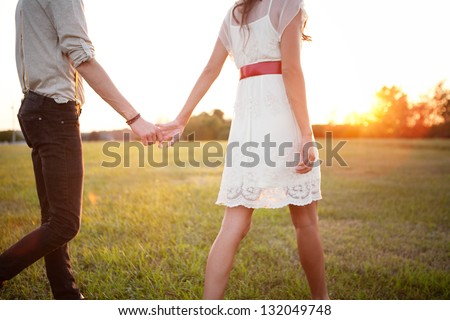 https://thumb1.shutterstock.com/display_pic_with_logo/879928/132049748/stock-photo-couple-holding-hands-walking-away-132049748.jpg