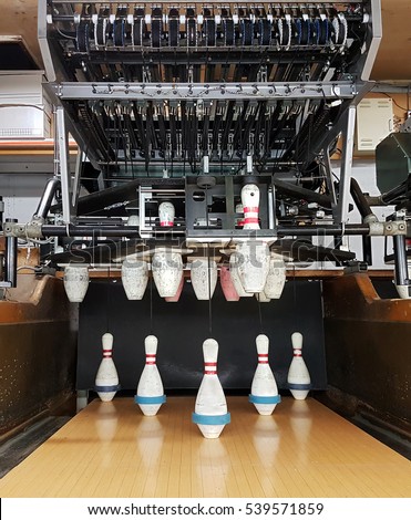 bowling alley pin setting machine