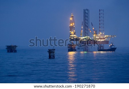 Oil rigs in an open sea