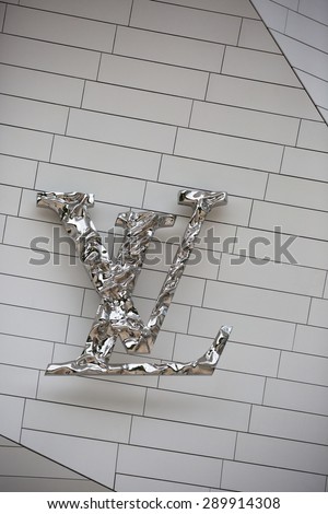 PARIS, FRANCE - MAY 1, 2015: Louis Vuitton Foundation building - LV logo detail