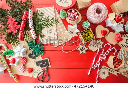 Advent calender with gift bags and boxes filled with candy
