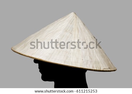 Man with traditional hat from Asia made of wicker