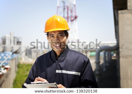 Portrait of asian engineer smiling look on you camera
